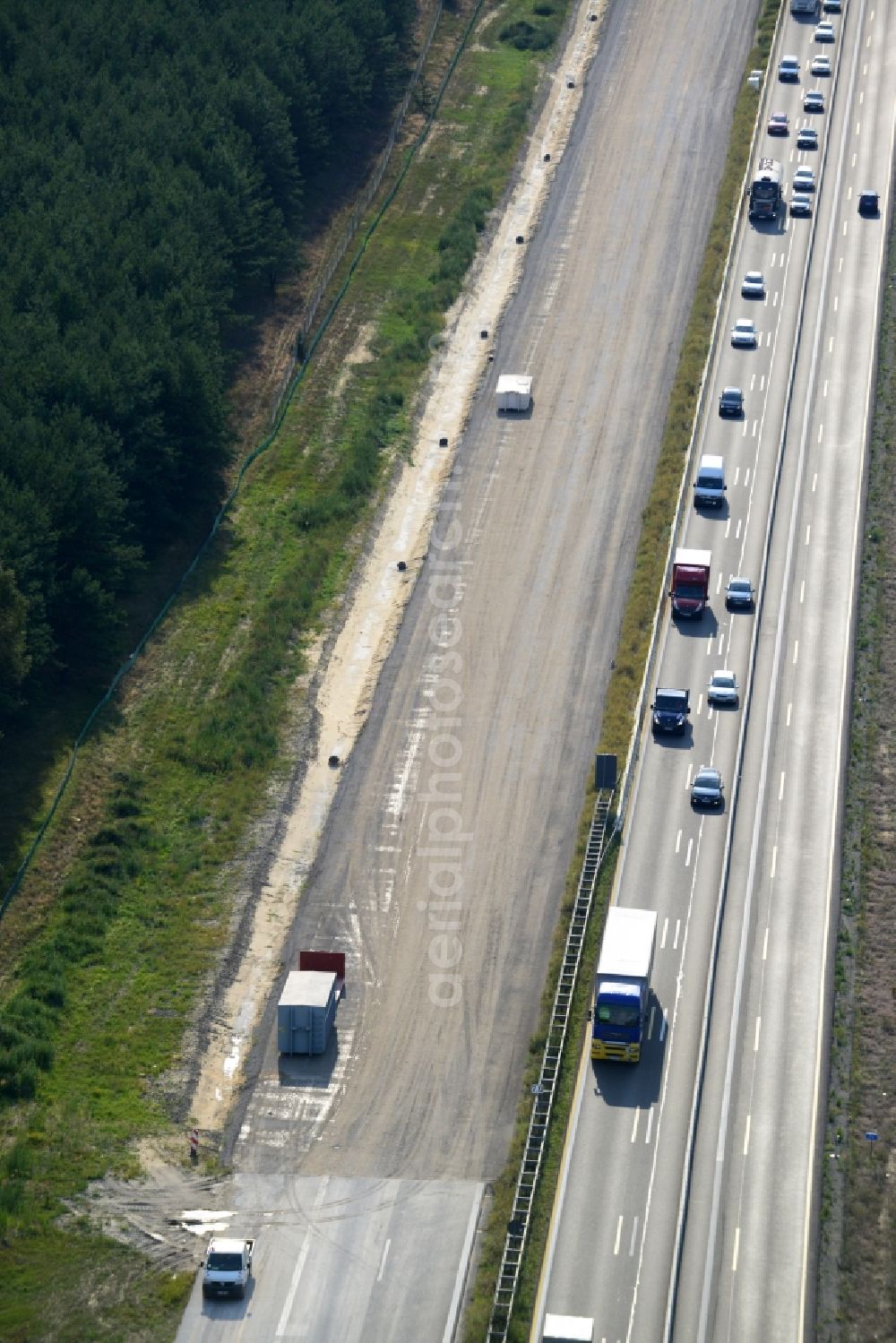 Aerial image Spreenhagen - View expansion and widening of the route of the highway / motorway BAB A12 / E30 Spreenhagen in the state of Brandenburg. The picture shows a concrete paver contractor eurovia in the production of the new road surface