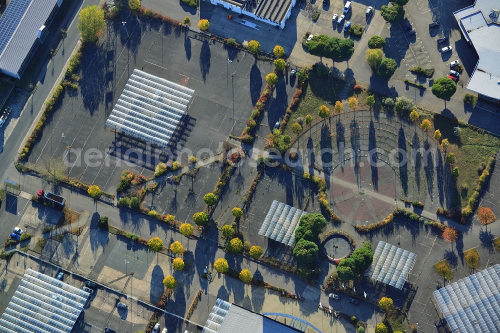 Hoppegarten from above - The Carena car park Hoppegarten in the state of Brandenburg is one of the biggest used car markets in the region. On the grounds cars are bought, processed and resold