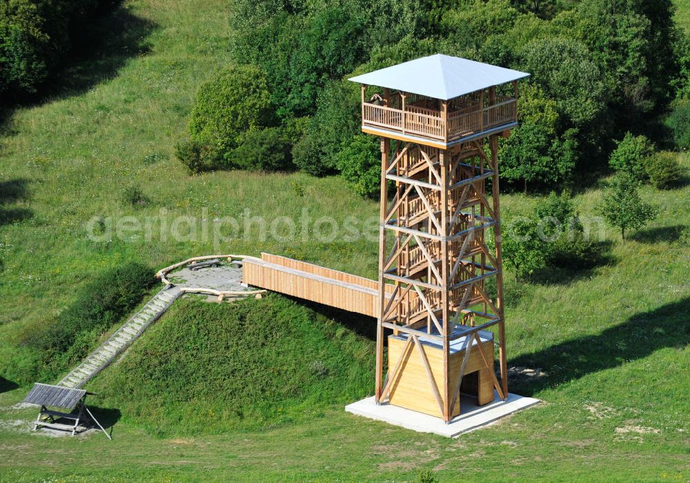 Eisenach from above - Der 2011 neu errichtete Aussichtsturm Hainich-Blick ist eine 20 Meter hohe Holzkonstruktion, für die nur einheimische Nutzholzarten verwendet wurden. Er steht bei Hütscheroda in der Nähe von Eisenach in Thüringen am Wildkatzenpfad im Nationalpark Hainich, welcher zum UNESCO-Weltnaturerbe gehört, und dient zur Orientierung im südlichen Offengelände des Parkes. 2011 newly raised viewing tower Hainich-Blick is a 20 metres high wood construction, for which solely domestic timber was used. It is located close to Hütscheroda near city Eisenach in Thuringia at Wildkatzenpfad of Hainich National Park, which ranks among UNESCO World Heritage - natural site. The tower serves for the orientation in southern parts of the park.