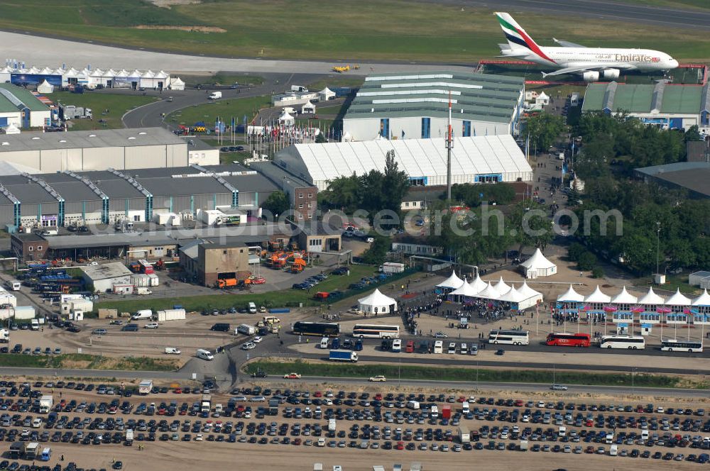 Schönefeld from the bird's eye view: Blick auf das Ausstellungsgelände der Internationalen Luftfahrtshow ILA 2010 auf dem Gelände des Flughafen Berlin-Schönefeld wenige Minuten vor der Eröffnung. View of the exhibition grounds of the International Air Show ILA 2010 on the grounds of the airport Berlin-Schönefeld few minutes before the opening.