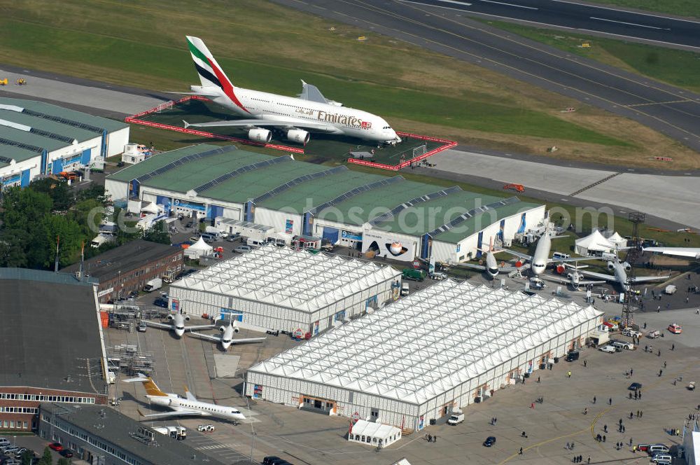 Schönefeld from the bird's eye view: Blick auf das Ausstellungsgelände der Internationalen Luftfahrtshow ILA 2010 auf dem Gelände des Flughafen Berlin-Schönefeld wenige Minuten vor der Eröffnung. View of the exhibition grounds of the International Air Show ILA 2010 on the grounds of the airport Berlin-Schönefeld few minutes before the opening.