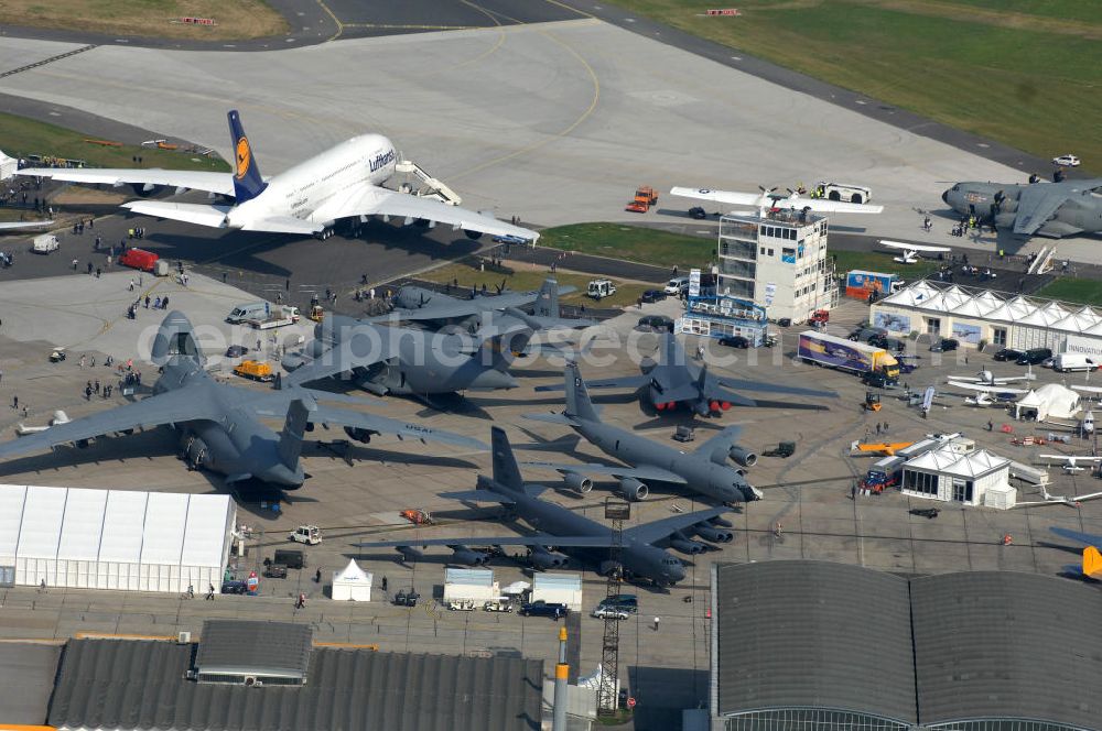 Aerial photograph Schönefeld - Blick auf das Ausstellungsgelände der Internationalen Luftfahrtshow ILA 2010 auf dem Gelände des Flughafen Berlin-Schönefeld wenige Minuten vor der Eröffnung. View of the exhibition grounds of the International Air Show ILA 2010 on the grounds of the airport Berlin-Schönefeld few minutes before the opening.