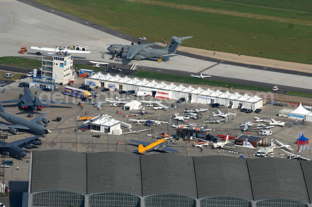 Schönefeld from above - Blick auf das Ausstellungsgelände der Internationalen Luftfahrtshow ILA 2010 auf dem Gelände des Flughafen Berlin-Schönefeld wenige Minuten vor der Eröffnung. View of the exhibition grounds of the International Air Show ILA 2010 on the grounds of the airport Berlin-Schönefeld few minutes before the opening.