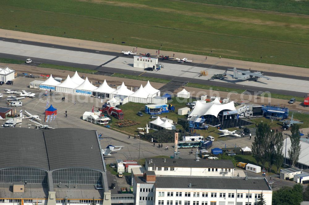 Schönefeld from the bird's eye view: Blick auf das Ausstellungsgelände der Internationalen Luftfahrtshow ILA 2010 auf dem Gelände des Flughafen Berlin-Schönefeld wenige Minuten vor der Eröffnung. View of the exhibition grounds of the International Air Show ILA 2010 on the grounds of the airport Berlin-Schönefeld few minutes before the opening.