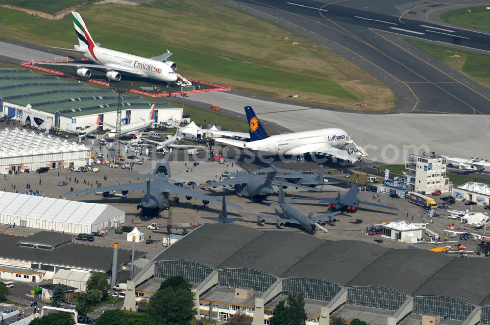 Schönefeld from the bird's eye view: Blick auf das Ausstellungsgelände der Internationalen Luftfahrtshow ILA 2010 auf dem Gelände des Flughafen Berlin-Schönefeld wenige Minuten vor der Eröffnung. View of the exhibition grounds of the International Air Show ILA 2010 on the grounds of the airport Berlin-Schönefeld few minutes before the opening.