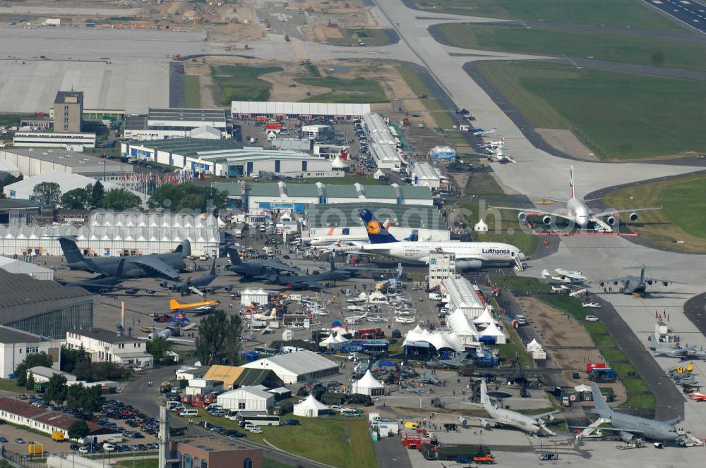 Schönefeld from the bird's eye view: Blick auf das Ausstellungsgelände der Internationalen Luftfahrtshow ILA 2010 auf dem Gelände des Flughafen Berlin-Schönefeld wenige Minuten vor der Eröffnung. View of the exhibition grounds of the International Air Show ILA 2010 on the grounds of the airport Berlin-Schönefeld few minutes before the opening.