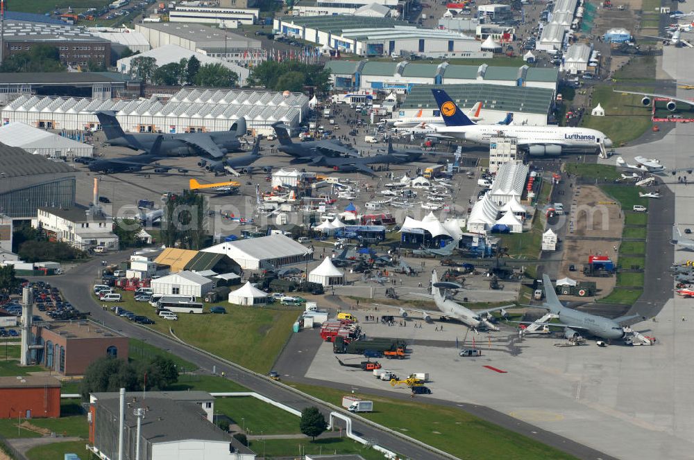 Aerial photograph Schönefeld - Blick auf das Ausstellungsgelände der Internationalen Luftfahrtshow ILA 2010 auf dem Gelände des Flughafen Berlin-Schönefeld wenige Minuten vor der Eröffnung. View of the exhibition grounds of the International Air Show ILA 2010 on the grounds of the airport Berlin-Schönefeld few minutes before the opening.