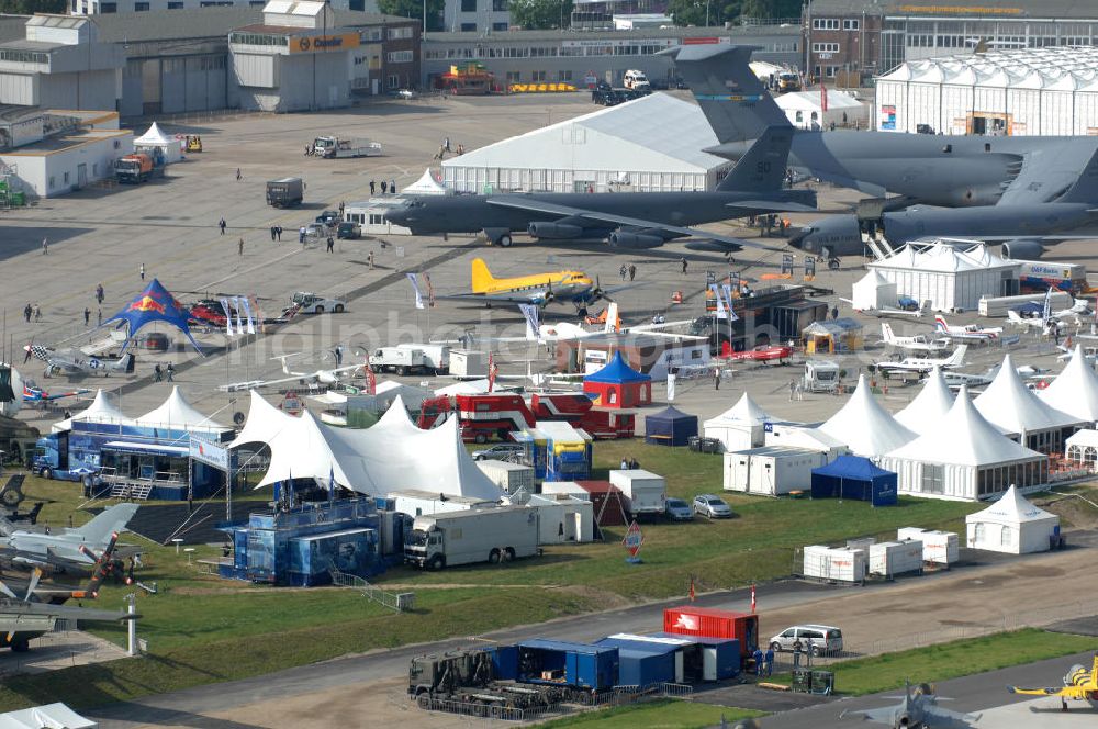 Aerial photograph Schönefeld - Blick auf das Ausstellungsgelände der Internationalen Luftfahrtshow ILA 2010 auf dem Gelände des Flughafen Berlin-Schönefeld wenige Minuten vor der Eröffnung. View of the exhibition grounds of the International Air Show ILA 2010 on the grounds of the airport Berlin-Schönefeld few minutes before the opening.