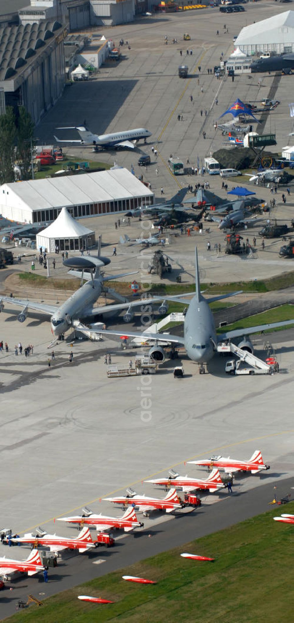 Schönefeld from the bird's eye view: Blick auf das Ausstellungsgelände der Internationalen Luftfahrtshow ILA 2010 auf dem Gelände des Flughafen Berlin-Schönefeld wenige Minuten vor der Eröffnung. View of the exhibition grounds of the International Air Show ILA 2010 on the grounds of the airport Berlin-Schönefeld few minutes before the opening.