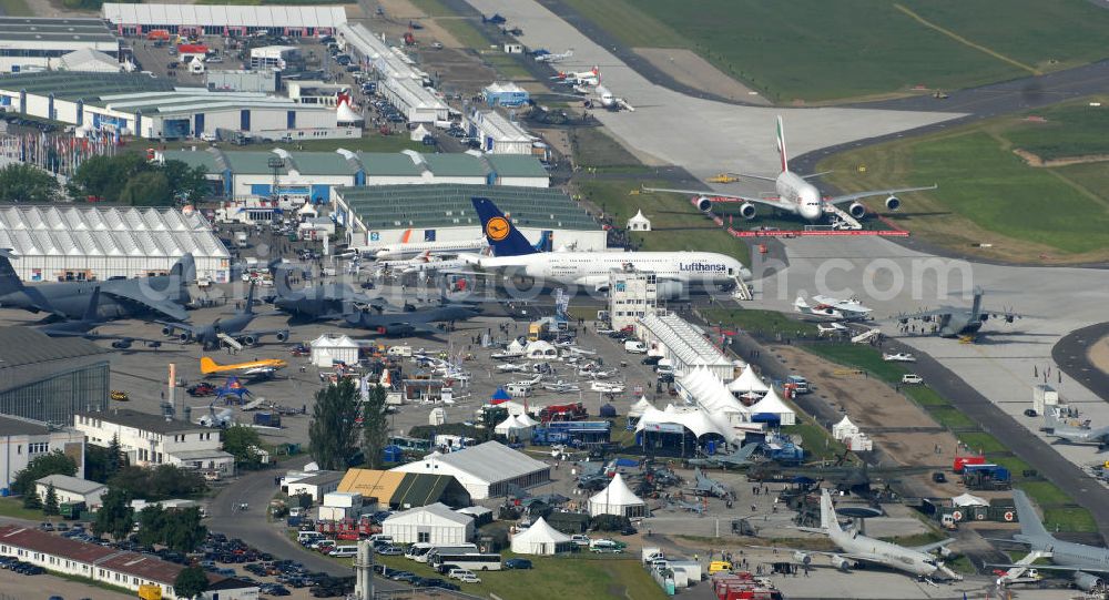 Schönefeld from the bird's eye view: Blick auf das Ausstellungsgelände der Internationalen Luftfahrtshow ILA 2010 auf dem Gelände des Flughafen Berlin-Schönefeld wenige Minuten vor der Eröffnung. View of the exhibition grounds of the International Air Show ILA 2010 on the grounds of the airport Berlin-Schönefeld few minutes before the opening.