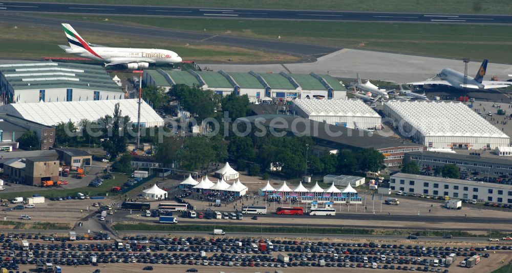 Aerial photograph Schönefeld - Blick auf das Ausstellungsgelände der Internationalen Luftfahrtshow ILA 2010 auf dem Gelände des Flughafen Berlin-Schönefeld wenige Minuten vor der Eröffnung. View of the exhibition grounds of the International Air Show ILA 2010 on the grounds of the airport Berlin-Schönefeld few minutes before the opening.