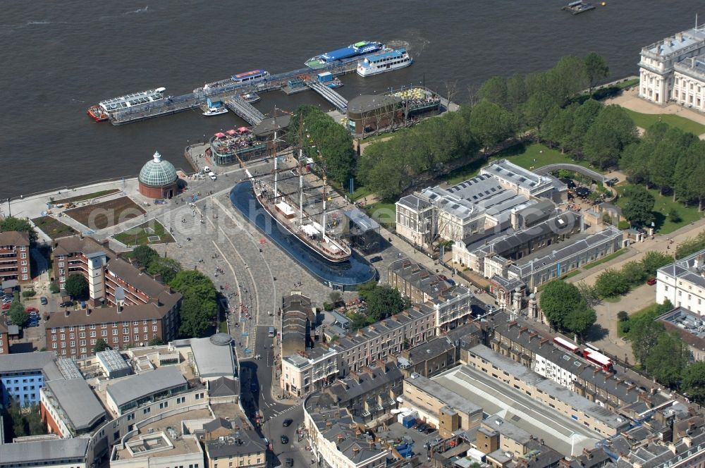 London from the bird's eye view: View of the exhibition area with the glass of dry English tea and wool clipper / sailing ship Cutty Sark in London. The Cutty Sark is an English tea and wool clipper. It was completed in 1869 and was one of the fastest sailing ships of their time