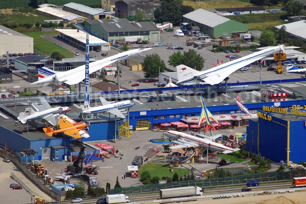 Sinsheim from the bird's eye view: Auto & Technik Museum Sinsheim. Auf 30.000 qm Hallenfläche befinden sich hier mehr als 3.000 Exponate, darunter die Concorde der Air France, Oldtimer, Flugzeuge, Formel-1-Wagen, Motorräder und Lokomotiven. Auf dem Gelände ist auch das IMAX 3D Filmtheater. Kontakt: Auto & Technik MUSEUM SINSHEIM / IMAX 3D Filmtheater, Museumsplatz, D-74889 Sinsheim, Tel.: 0049 (0) 7261 / 9299-0, Fax: 0049 (0) 7261 / 13916,