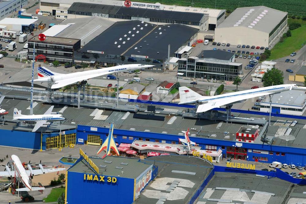 Sinsheim from above - Auto & Technik Museum Sinsheim. Auf 30.000 qm Hallenfläche befinden sich hier mehr als 3.000 Exponate, darunter die Concorde der Air France, Oldtimer, Flugzeuge, Formel-1-Wagen, Motorräder und Lokomotiven. Auf dem Gelände ist auch das IMAX 3D Filmtheater. Kontakt: Auto & Technik MUSEUM SINSHEIM / IMAX 3D Filmtheater, Museumsplatz, D-74889 Sinsheim, Tel.: 0049 (0) 7261 / 9299-0, Fax: 0049 (0) 7261 / 13916,