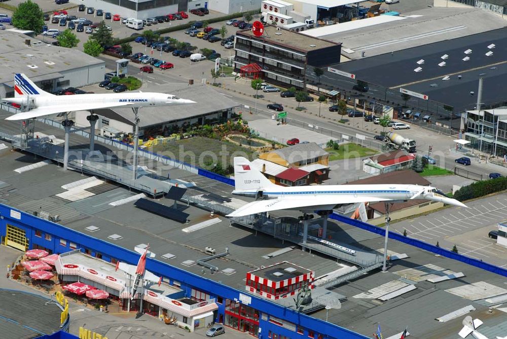 Sinsheim from the bird's eye view: Auto & Technik Museum Sinsheim. Auf 30.000 qm Hallenfläche befinden sich hier mehr als 3.000 Exponate, darunter die Concorde der Air France, Oldtimer, Flugzeuge, Formel-1-Wagen, Motorräder und Lokomotiven. Auf dem Gelände ist auch das IMAX 3D Filmtheater. Kontakt: Auto & Technik MUSEUM SINSHEIM / IMAX 3D Filmtheater, Museumsplatz, D-74889 Sinsheim, Tel.: 0049 (0) 7261 / 9299-0, Fax: 0049 (0) 7261 / 13916,