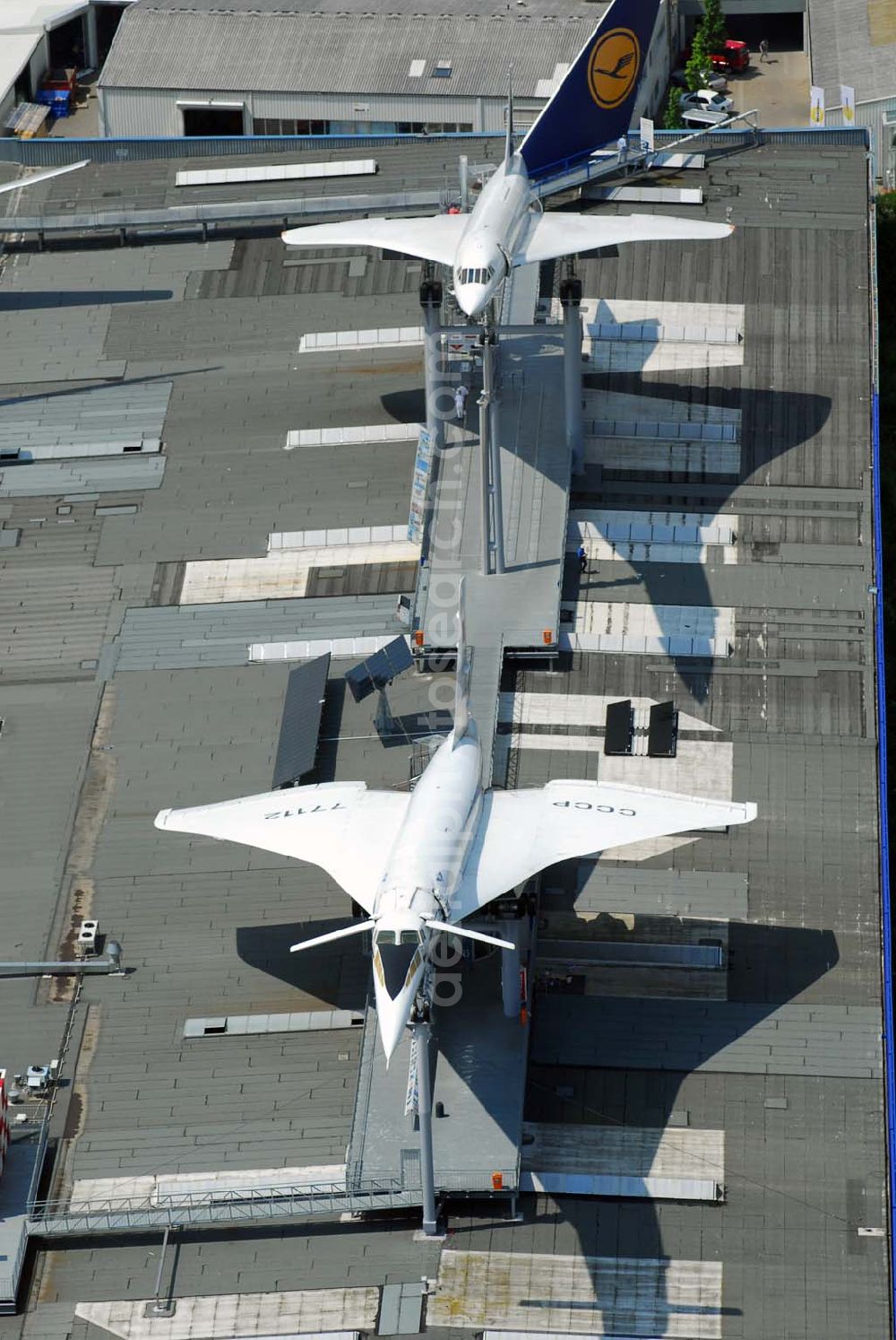 Sinsheim from the bird's eye view: Auto & Technik Museum Sinsheim. Auf 30.000 qm Hallenfläche befinden sich hier mehr als 3.000 Exponate, darunter die Concorde der Air France, Oldtimer, Flugzeuge, Formel-1-Wagen, Motorräder und Lokomotiven. Auf dem Gelände ist auch das IMAX 3D Filmtheater. Kontakt: Auto & Technik MUSEUM SINSHEIM / IMAX 3D Filmtheater, Museumsplatz, D-74889 Sinsheim, Tel.: 0049 (0) 7261 / 9299-0, Fax: 0049 (0) 7261 / 13916,