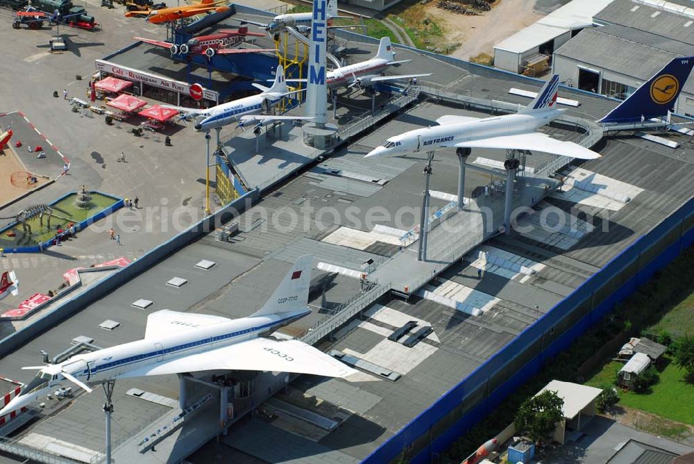 Aerial image Sinsheim - Auto & Technik Museum Sinsheim. Auf 30.000 qm Hallenfläche befinden sich hier mehr als 3.000 Exponate, darunter die Concorde der Air France, Oldtimer, Flugzeuge, Formel-1-Wagen, Motorräder und Lokomotiven. Auf dem Gelände ist auch das IMAX 3D Filmtheater. Kontakt: Auto & Technik MUSEUM SINSHEIM / IMAX 3D Filmtheater, Museumsplatz, D-74889 Sinsheim, Tel.: 0049 (0) 7261 / 9299-0, Fax: 0049 (0) 7261 / 13916,