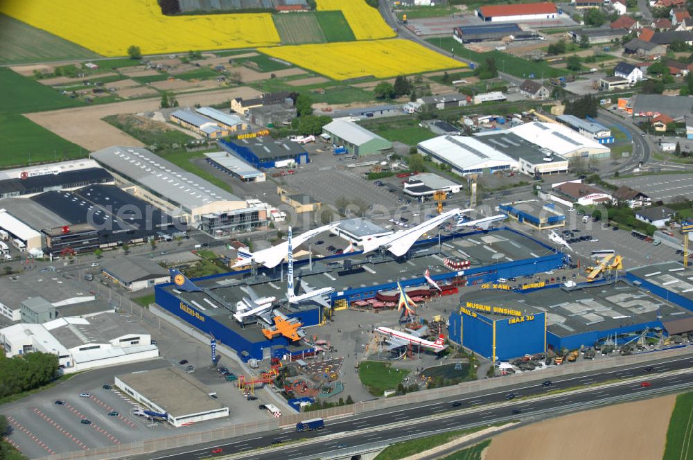 Sinsheim from the bird's eye view: Auto & Technik Museum Sinsheim. Auf 30.000 qm Hallenfläche befinden sich hier mehr als 3.000 Exponate, darunter die Concorde der Air France,die russische TU-144, Oldtimer, Flugzeuge, Formel-1-Wagen, Motorräder und Lokomotiven. Auf dem Gelände ist auch das IMAX 3D Filmtheater. Kontakt: Auto & Technik MUSEUM SINSHEIM / IMAX 3D Filmtheater, Museumsplatz, D-74889 Sinsheim, Tel.: 0049 (0) 7261 / 9299-0, Fax: 0049 (0) 7261 / 13916,