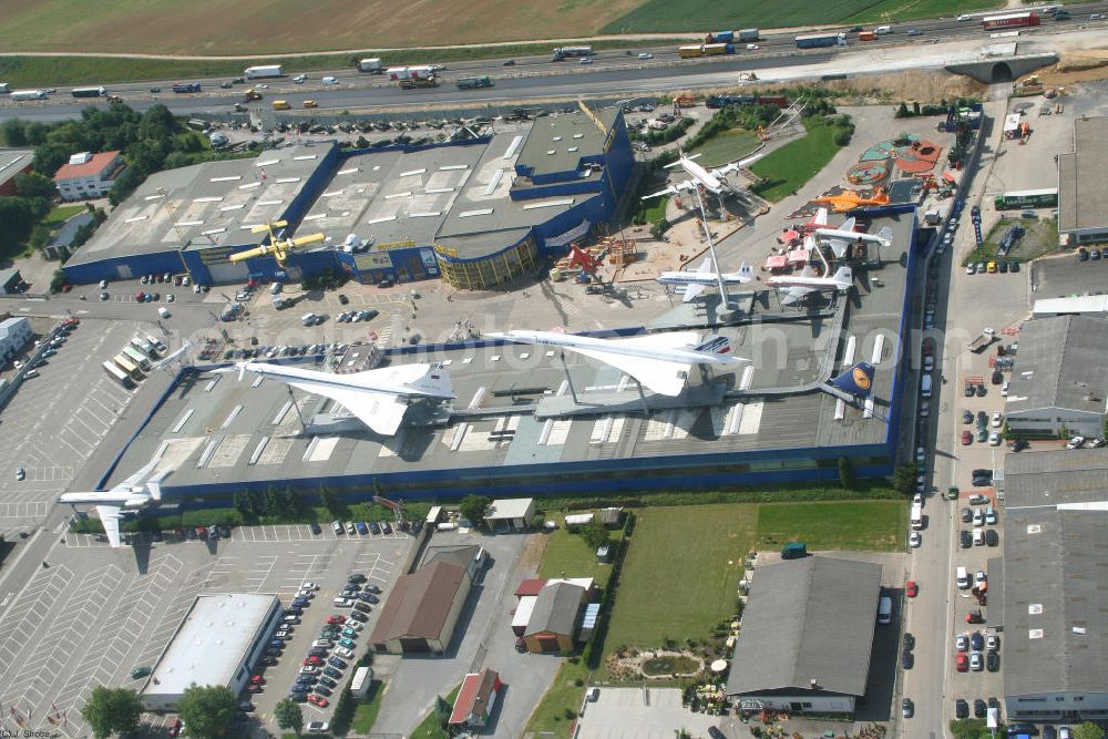 Sinsheim from the bird's eye view: Blick auf das Auto & Technik Museum Sinsheim. Auf 30.000 qm Hallenfläche befinden sich hier mehr als 3.000 Exponate, darunter die Concorde der Air France,die russische TU-144, Oldtimer, Flugzeuge, Formel-1-Wagen, Motorräder und Lokomotiven. Auf dem Gelände ist auch das IMAX 3D Filmtheater. Kontakt: Auto & Technik MUSEUM SINSHEIM / IMAX 3D Filmtheater, Museumsplatz, D-74889 Sinsheim, Tel.: 0049 (0) 7261 / 9299-0, Fax: 0049 (0) 7261 / 13916,