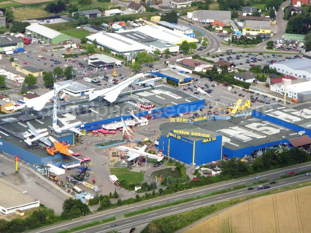 Sinsheim / Baden-Württemberg from the bird's eye view: Das Auto & Technik MUSEUM SINSHEIM ist eine Erlebniswelt für Jung und Alt! Auf über 30.000 qm Hallenfläche erwarten Sie mehr als 3.000 Ausstellungsstücke, darunter die Original CONCORDE der Air-France, die russische Concorde Tupolev TU-144, mehr als 300 Oldtimer, 200 Motorräder, 40 Sportwagen, usw... Auto & Technik Museum Sinsheim e.V. IMAX 3D Filmtheater Museumsplatz, D-74889 Sinsheim Tel.: 07261 / 9299-0Fax: 07261 / 13916