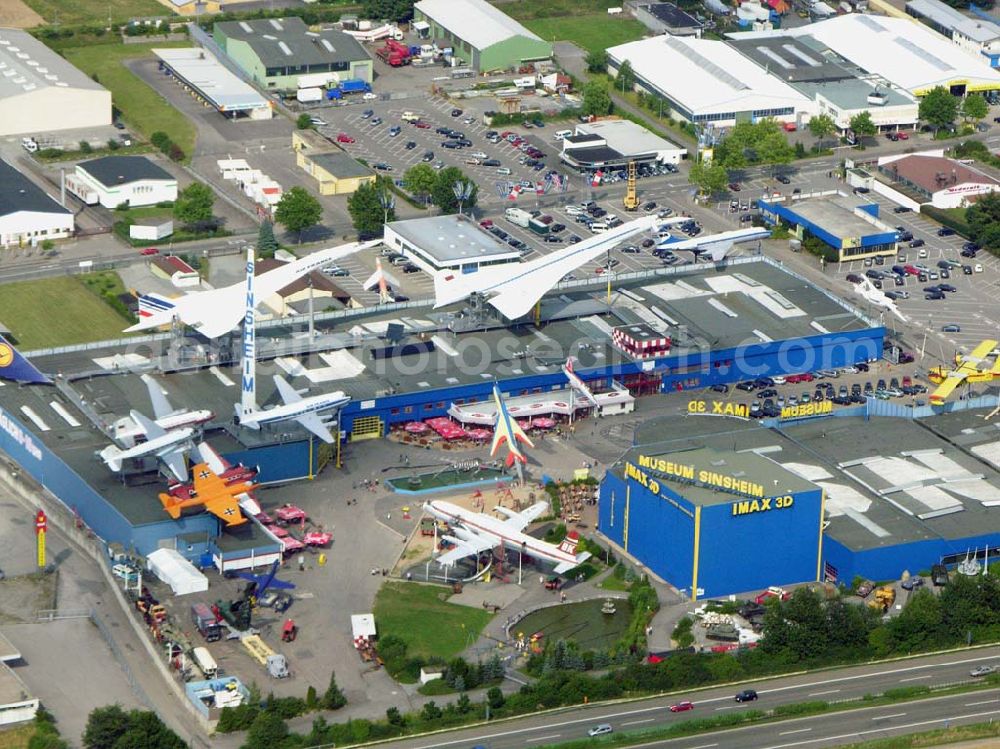 Aerial image Sinsheim / Baden-Württemberg - Das Auto & Technik MUSEUM SINSHEIM ist eine Erlebniswelt für Jung und Alt! Auf über 30.000 qm Hallenfläche erwarten Sie mehr als 3.000 Ausstellungsstücke, darunter die Original CONCORDE der Air-France, die russische Concorde Tupolev TU-144, mehr als 300 Oldtimer, 200 Motorräder, 40 Sportwagen, usw... Auto & Technik Museum Sinsheim e.V. IMAX 3D Filmtheater Museumsplatz, D-74889 Sinsheim Tel.: 07261 / 9299-0Fax: 07261 / 13916