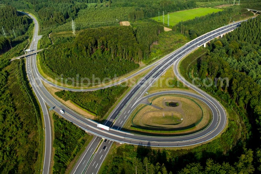 Aerial image Wenden - Routing and traffic lanes during the highway exit and access the motorway A4 at Krombach in Wenden in the state North Rhine-Westphalia