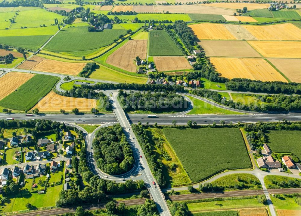 Bünde from above - Routing and traffic lanes during the highway exit and access the motorway A30 in Buende in the state North Rhine-Westphalia