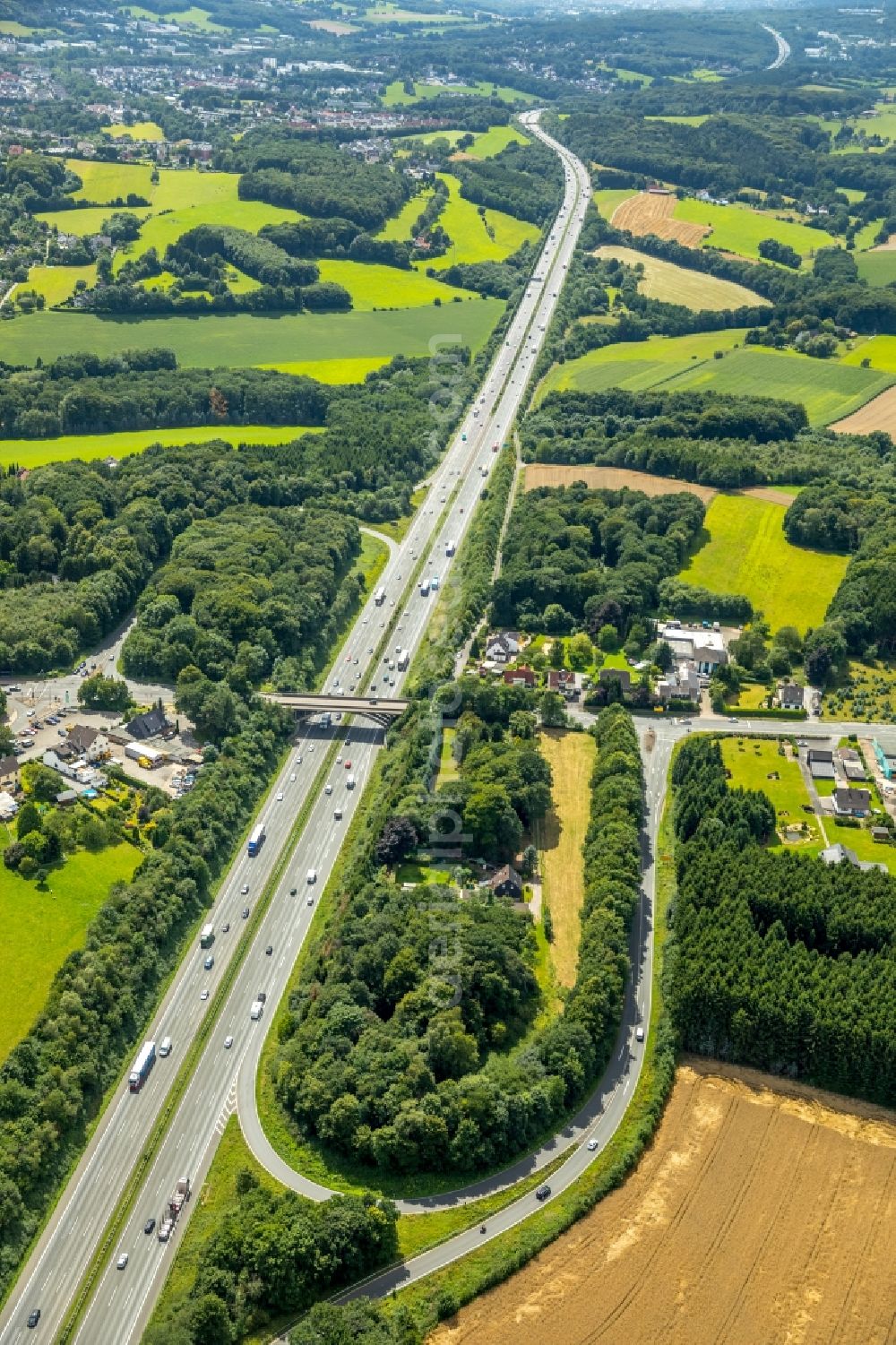 Gevelsberg from the bird's eye view: Routing and traffic lanes during the highway exit and access the motorway A with Bruecke in Gevelsberg in the state North Rhine-Westphalia, Germany