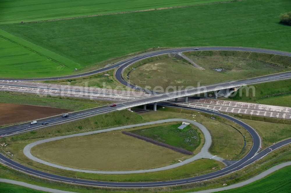 Colbitz from the bird's eye view: Routing and traffic lanes during the highway exit and access the motorway A 14 zu B189 in Colbitz in the state Saxony-Anhalt