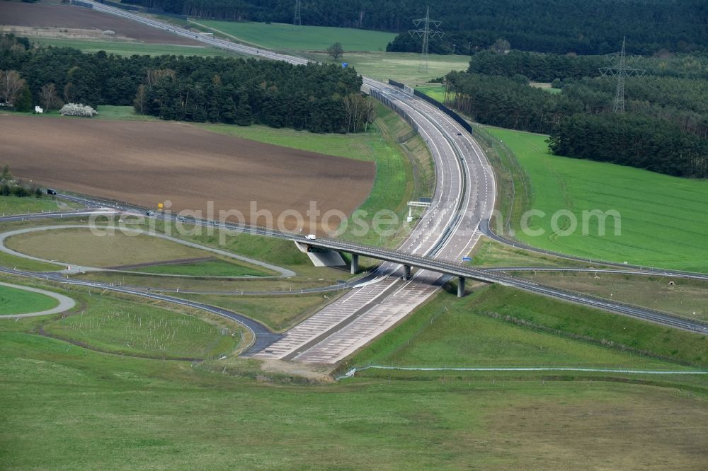 Colbitz from the bird's eye view: Routing and traffic lanes during the highway exit and access the motorway A 14 zu B189 in Colbitz in the state Saxony-Anhalt