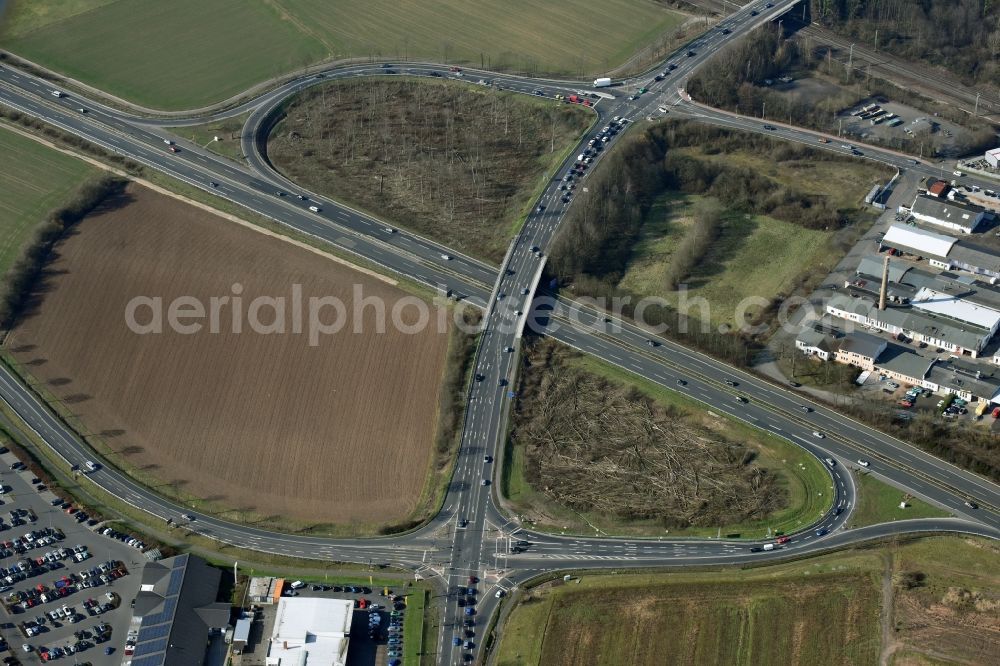 Aerial image Gelnhausen - Routing and traffic lanes during the highway exit and access the motorway A 66 Gelnhausen-West in Gelnhausen in the state Hesse