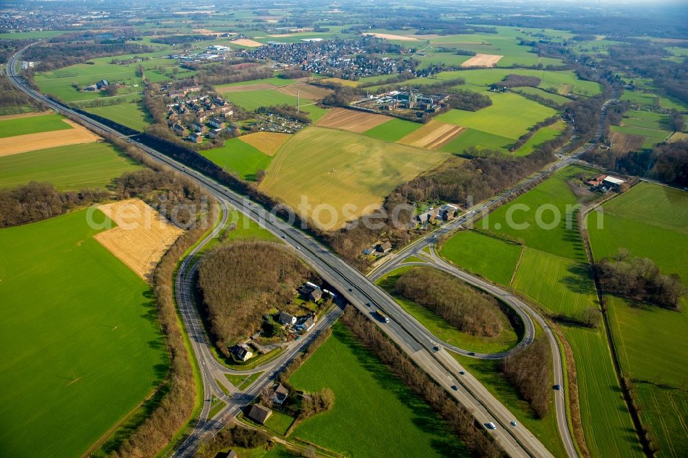 Kempen from the bird's eye view: Routing and traffic lanes during the highway exit and access the motorway A 40 Kerken in Kempen in the state North Rhine-Westphalia