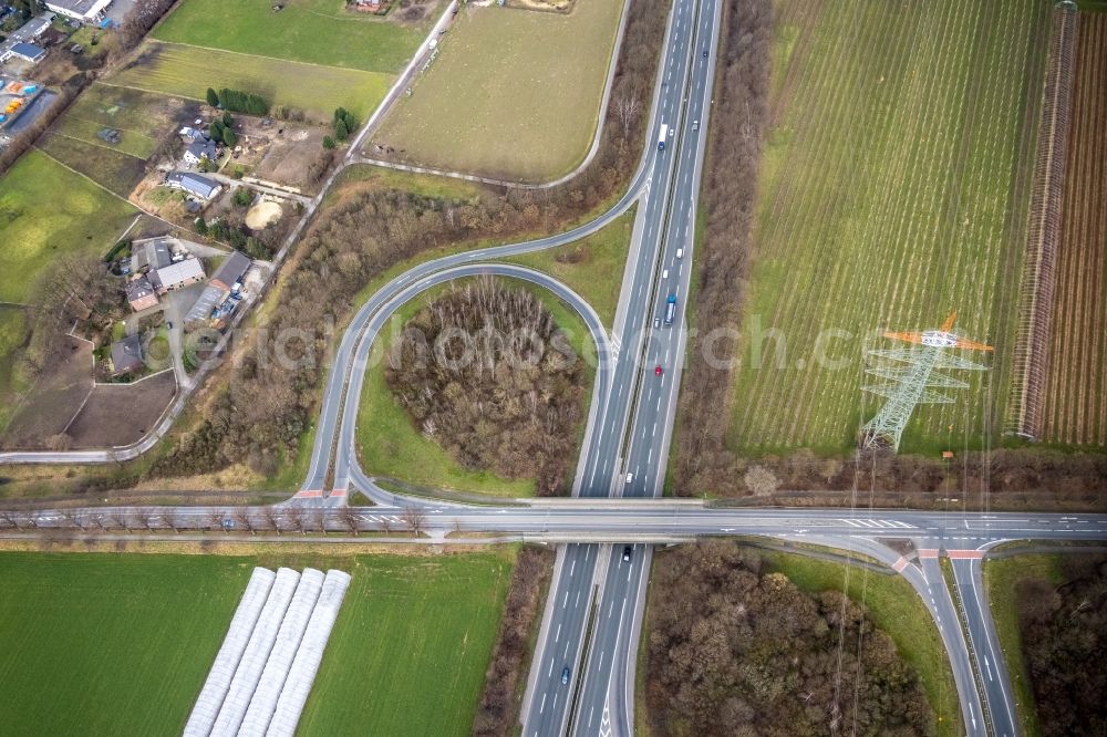 Aerial image Kirchhellen - Routing and traffic lanes during the highway exit and access the motorway A 31 in Kirchhellen in the state North Rhine-Westphalia, Germany