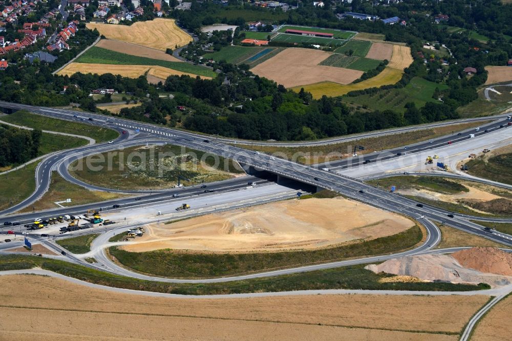 Würzburg from the bird's eye view: Routing and traffic lanes during the highway exit and access the motorway A 3 Wuerzburg-Heidingsfeld in Wuerzburg in the state Bavaria, Germany