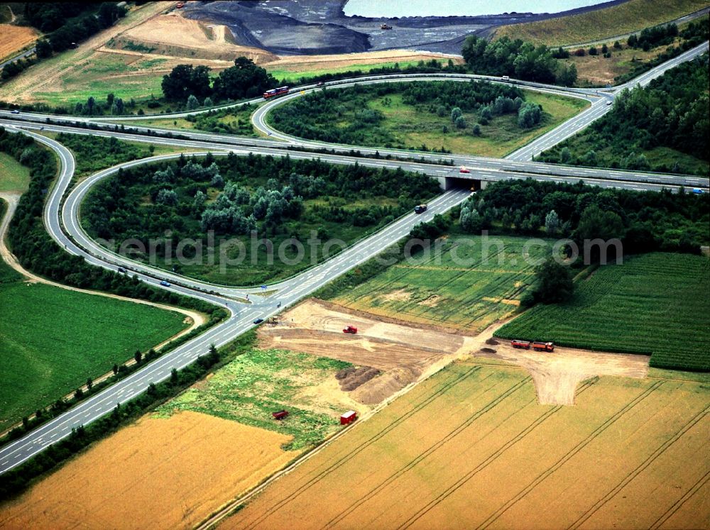 Aerial photograph Kamp-Lintfort - Routing and traffic lanes during the highway exit and access the motorway A57 to the federal motorway 510 in Kamp-Lintfort in the state North Rhine-Westphalia