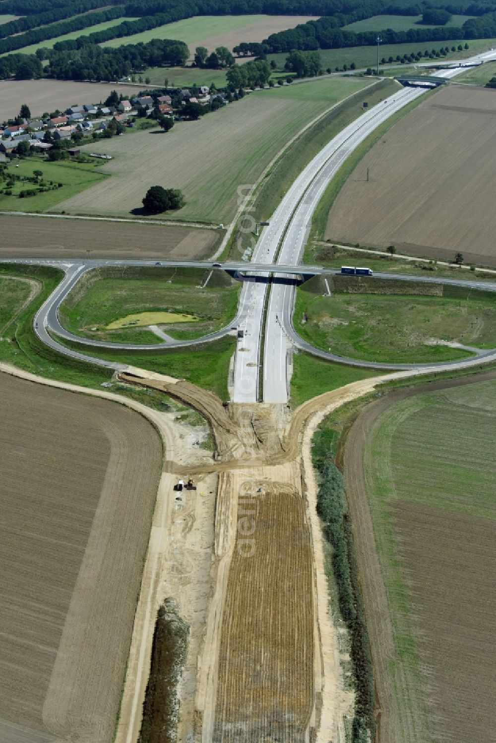 Karstädt from above - Routing and traffic lanes during the highway exit and access the motorway A 14 to federal street B5 in Karstaedt in the state Brandenburg