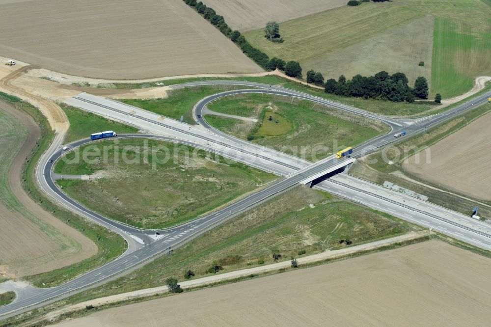 Aerial photograph Karstädt - Routing and traffic lanes during the highway exit and access the motorway A 14 to federal street B5 in Karstaedt in the state Brandenburg