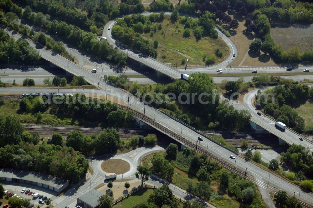 Aerial photograph Berlin - Routing and traffic lanes during the highway exit and access the motorway Maerkischen Allee in Berlin in Germany