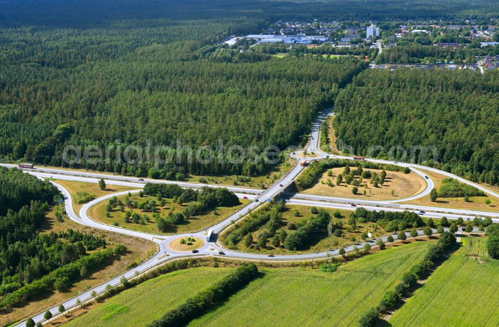 Aerial image Tarbek - Route and lanes in the course of the exit and access of the motorway junction of the BAB A21 Anschlussstelle Trappenkamp in Tarbek in the state Schleswig-Holstein, Germany