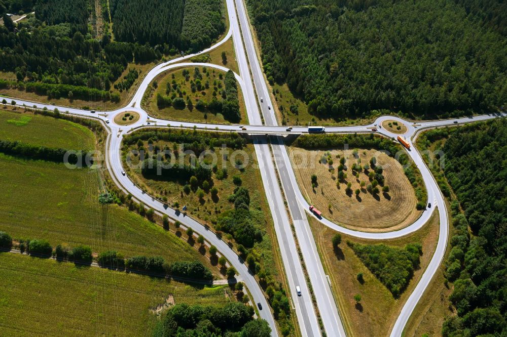 Aerial photograph Tarbek - Route and lanes in the course of the exit and access of the motorway junction of the BAB A21 Anschlussstelle Trappenkamp in Tarbek in the state Schleswig-Holstein, Germany