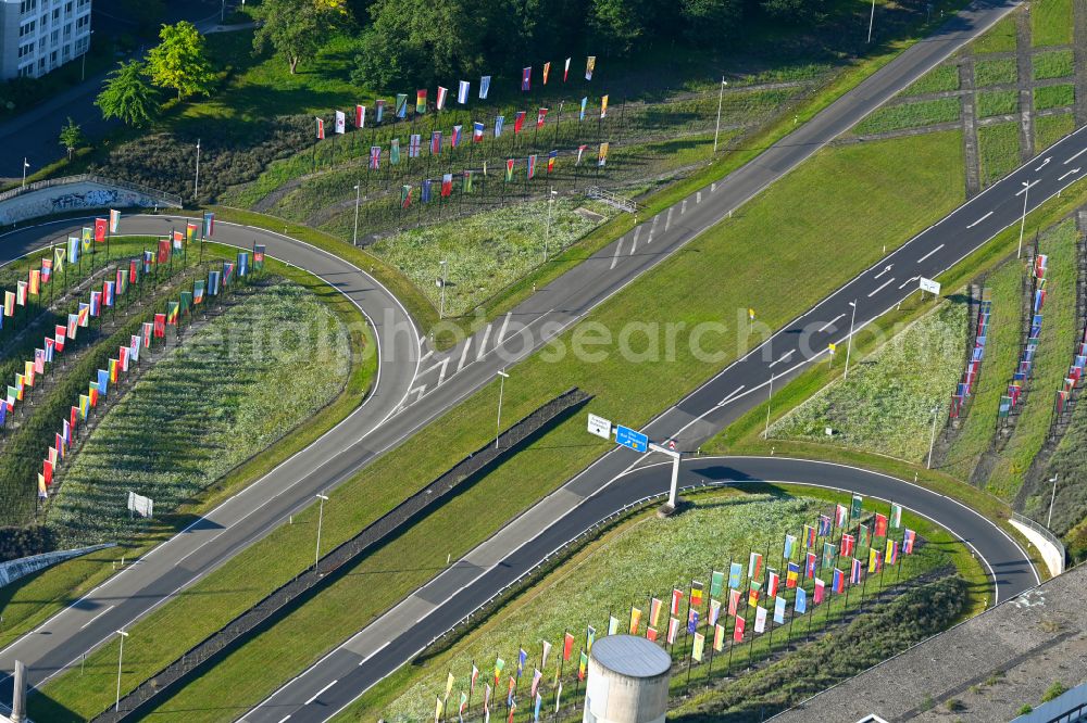 Bonn from the bird's eye view: Route and lanes lined with a sea of flags along the exit and entrance of the motorway junction of the BAB A562 at the Godesberger Allee - Olof-Palme-Allee in Bonn in the federal state of North Rhine-Westphalia, Germany