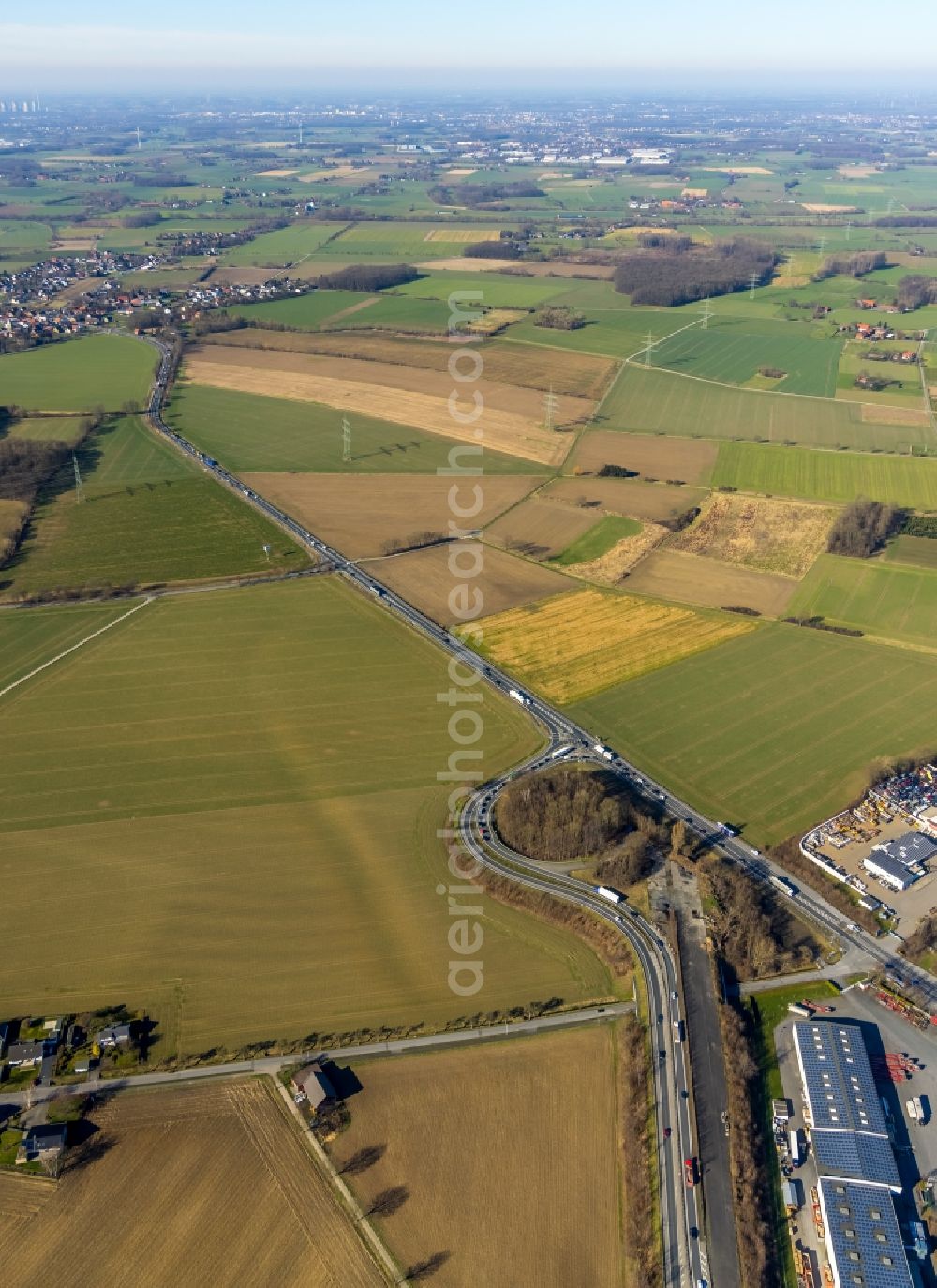 Werl from above - route and lanes in the course of the exit and access of the motorway junction of the BAB A445 on Bundesstrasse B63 am Industriegebiet on Hammer Strasse in Werl at Ruhrgebiet in the state North Rhine-Westphalia, Germany