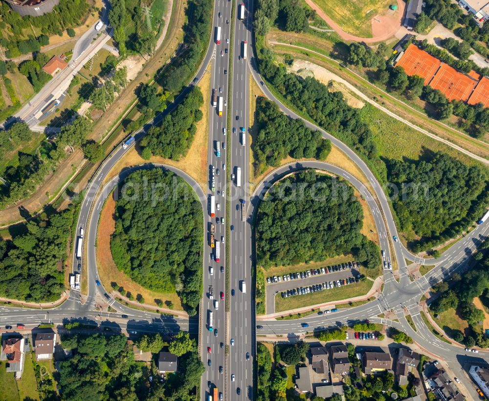 Oberhausen from the bird's eye view: Route and lanes in the course of the exit and access of the motorway junction of the BAB A3 - Koenigstrasse - Oberhausen-Holten in Oberhausen at Ruhrgebiet in the state North Rhine-Westphalia, Germany