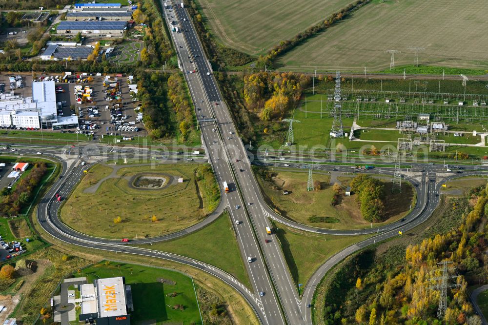 Leipzig from the bird's eye view: Route and lanes in the course of the exit and access of the motorway junction of the BAB A14 Leipzig-Ost in Leipzig in the state Saxony, Germany