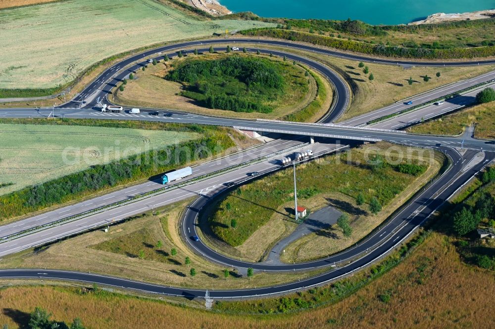 Penig from the bird's eye view: Route and lanes in the course of the exit and access of the motorway junction of the BAB A72 in Penig in the state Saxony, Germany