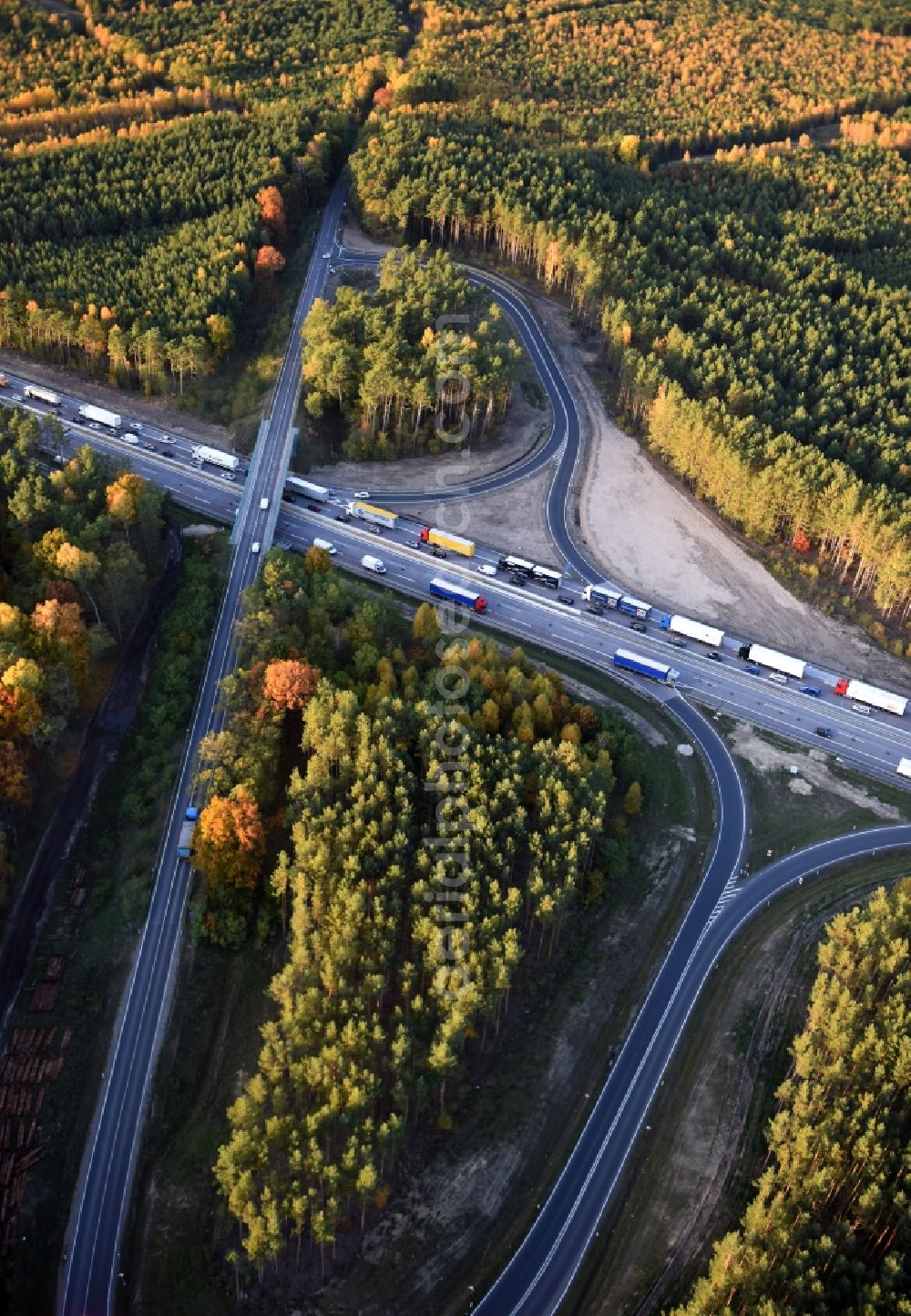 Dannenreich from the bird's eye view: Highway construction site for the expansion and extension of track along the route of A12 E30 an der Abfahrt Fredersdorf in Dannenreich in the state Brandenburg