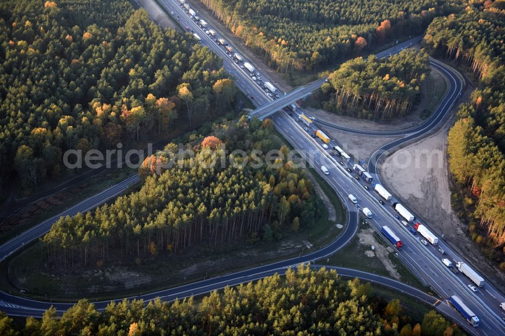 Aerial image Dannenreich - Highway construction site for the expansion and extension of track along the route of A12 E30 an der Abfahrt Fredersdorf in Dannenreich in the state Brandenburg