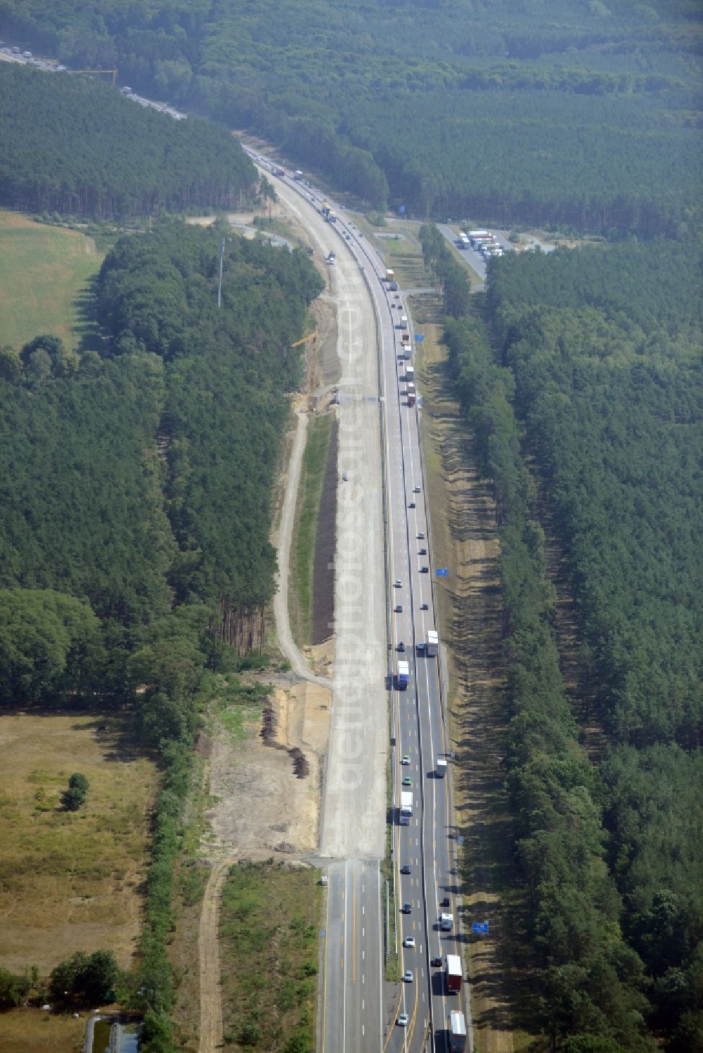 Neu Waltersdorf from the bird's eye view: Highway construction site for the expansion and extension of track along the route of A12 E30 in Neu Waltersdorf in the state Brandenburg