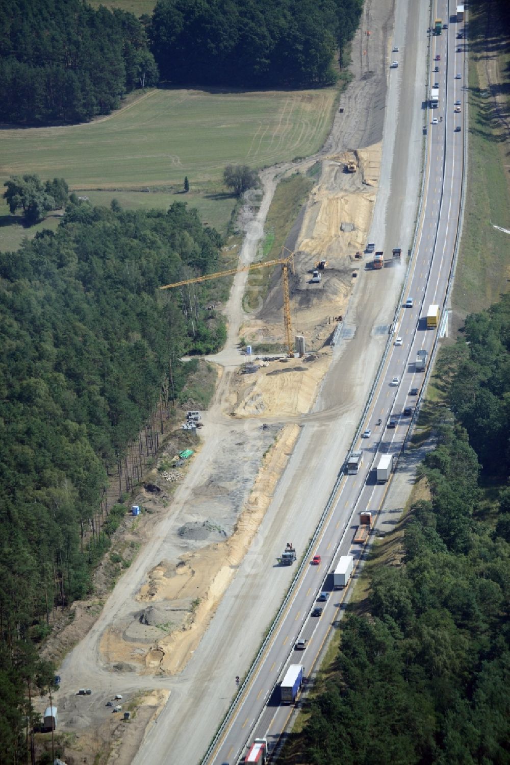 Neu Waltersdorf from the bird's eye view: Highway construction site for the expansion and extension of track along the route of A12 E30 in Neu Waltersdorf in the state Brandenburg