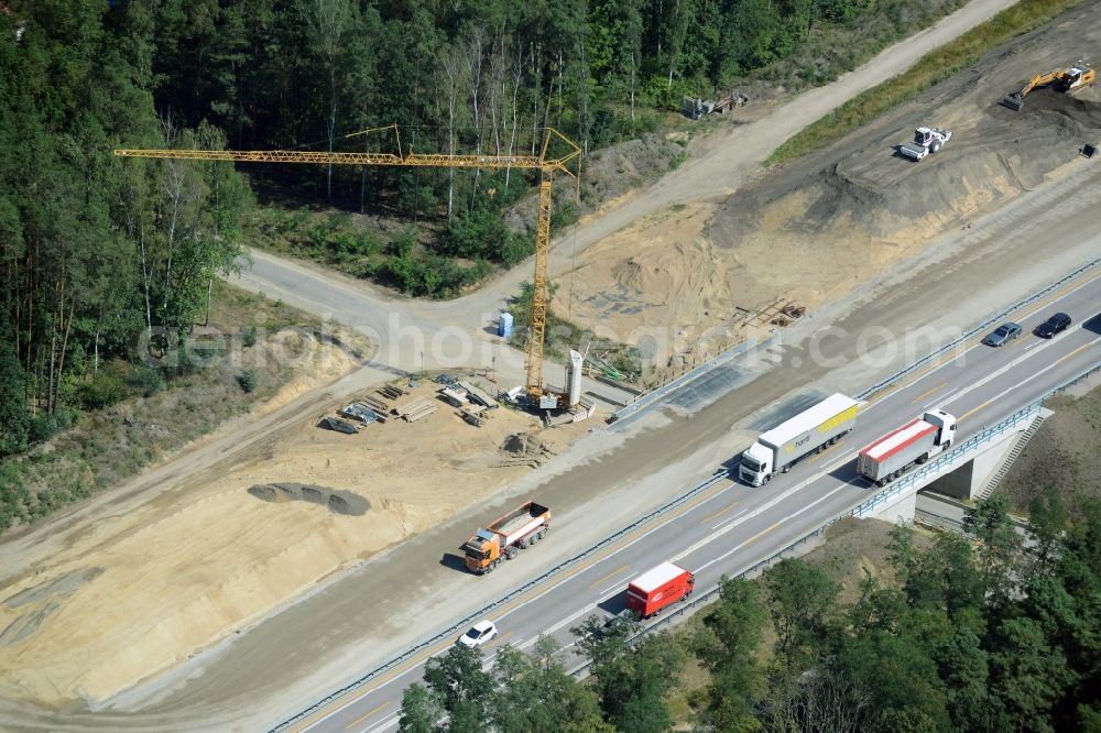 Neu Waltersdorf from the bird's eye view: Highway construction site for the expansion and extension of track along the route of A12 E30 in Neu Waltersdorf in the state Brandenburg